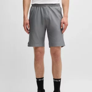 Quick-dry shorts with decorative reflective logo