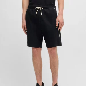 Stretch-cotton shorts with embossed artwork