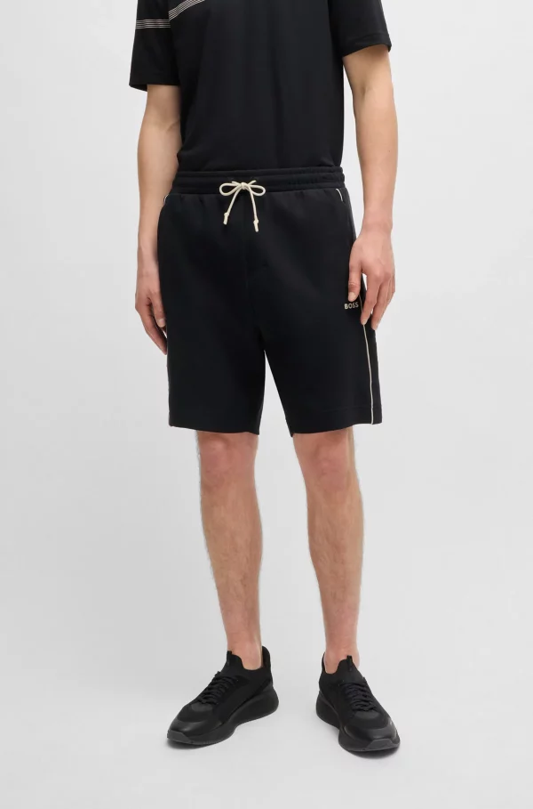 Stretch-cotton shorts with embossed artwork